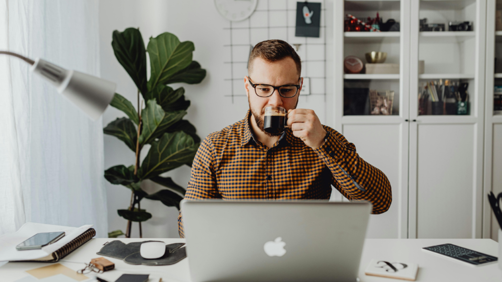 Remote worker using productivity apps while working from home in 202